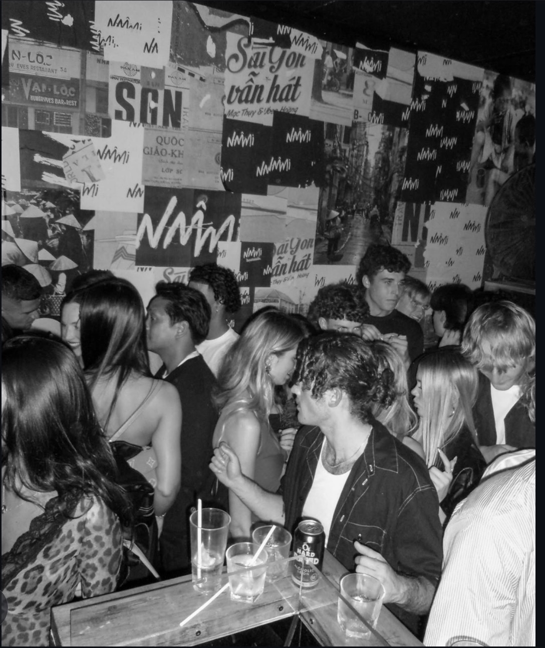 Packed crowd at Naami with lasers and smoke